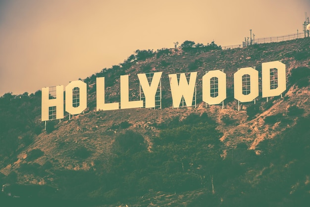 Фото Известные голливудские холмы в лос-анджелесе, калифорния, сша голливудская вывеска в винтажном цветовом сортировке