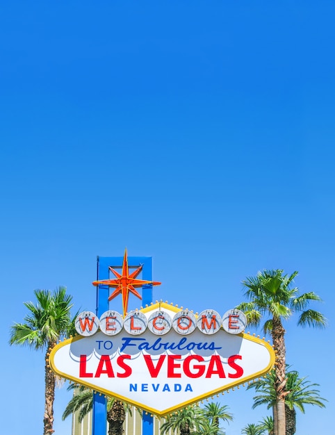 Famous Las Vegas sign on bright sunny day with blue sky background and copy space