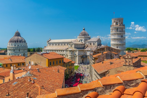 The famous Leaning Tower in Pisa Italy with beautiful blue sky