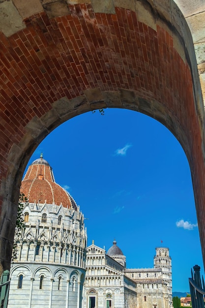 The famous Leaning Tower in Pisa Italy with beautiful blue sky