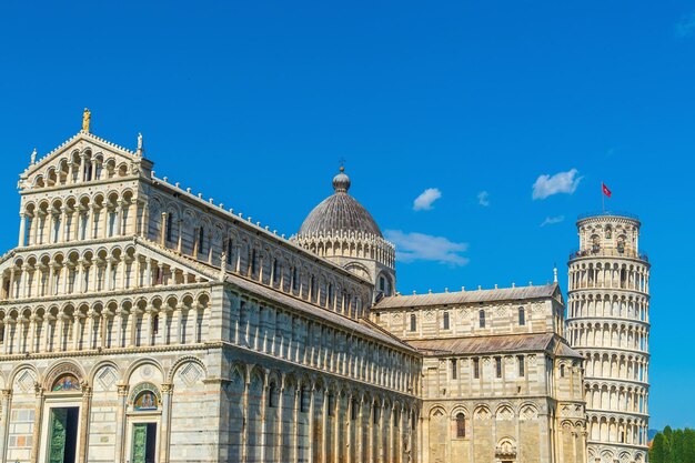 The famous Leaning Tower in Pisa Italy with beautiful blue sky