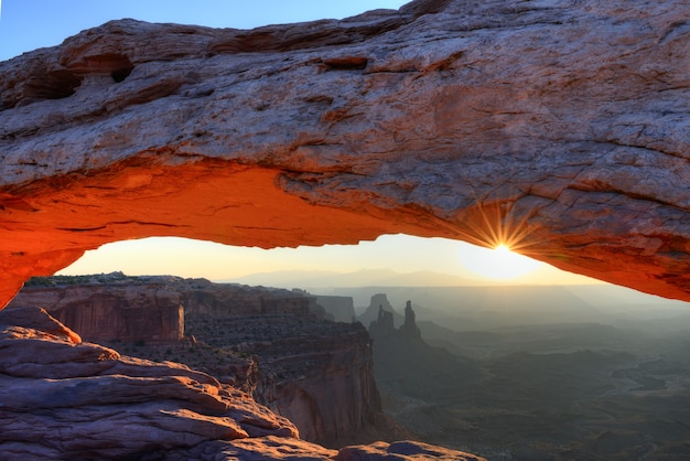 Famous Mesa Arch at sunrise, near Moab city, Utah, USA