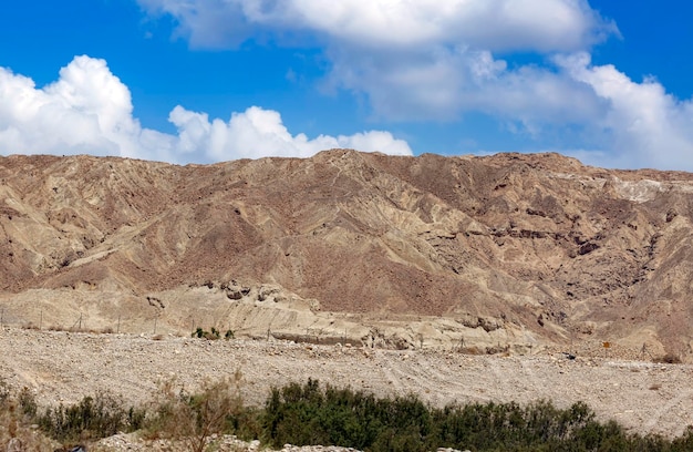 The famous Negev desert clouds in Israel at sunset Magic desert landscape view of Negev stone hill desert Israel Magic desert sand of Judean Mountains wild nature Israel Geological formation