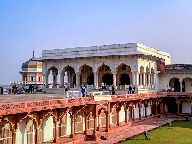 The famous red fort in the city of Agra India Tourists visit a popular tourist attraction