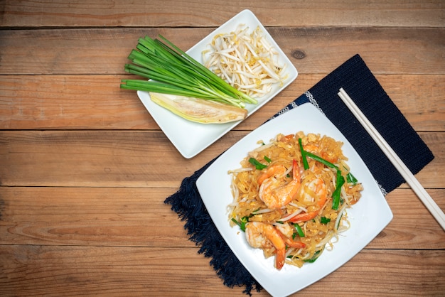 Famous thai food called pad thai on white plate