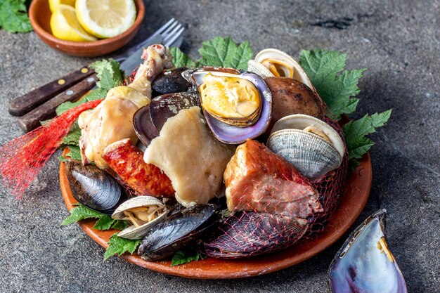 Famous traditional dish of the south of chile and the chiloe archipelago curanto kuranto different