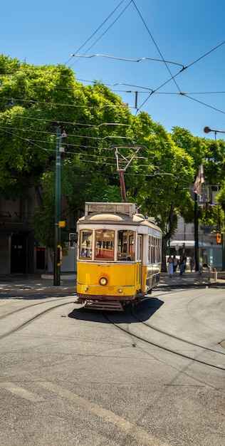 Famous and typical old yellow tram beautifully decorated and preserving the original designs