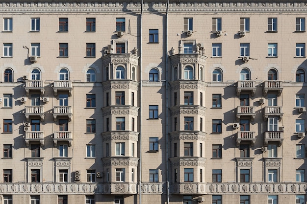 The faÑade is a classic  stone building with  stucco  column. Soviet architecture