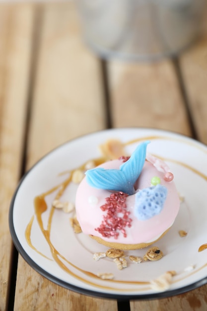 Fancy donut with cute mermaid on top