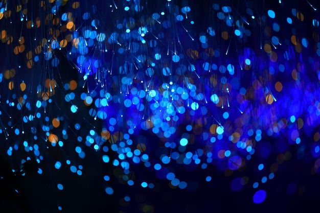 Fantastic blurry and bokeh dark blue theme background in the mystry cave