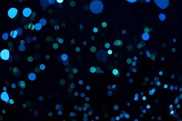 Fantastic blurry and bokeh dark blue theme background in the mystry cave