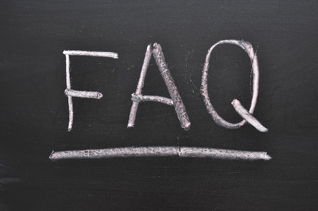 Faq text on chalkboard