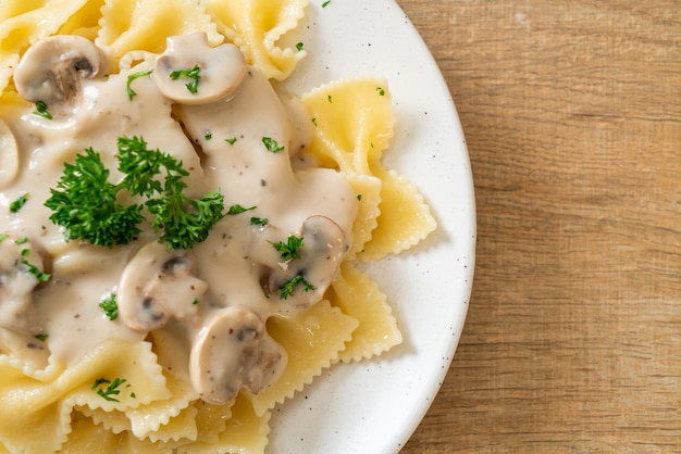 farfalle pasta with mushroom white cream sauce - Italian food style