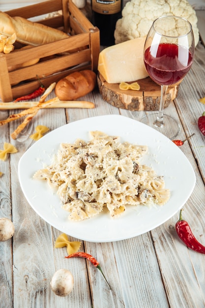 Farfalle pasta with mushrooms and creamy sauce