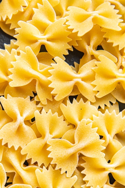 farfalle raw pasta cooking ingredient italian meal food snack on the table copy space food