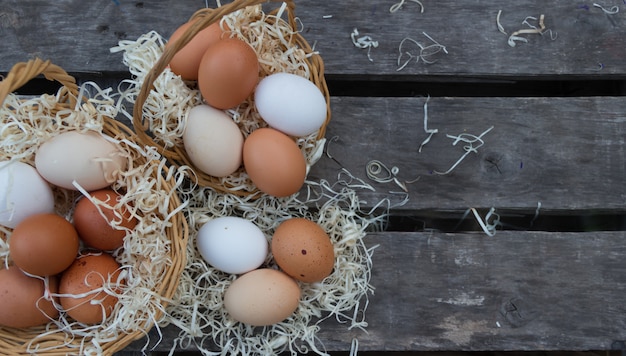 farm egg baskets top view on rustic wood