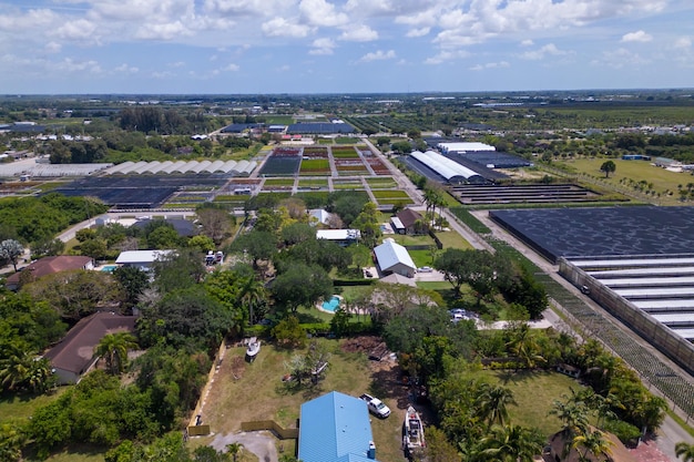 The farm is located in the center of the picture.