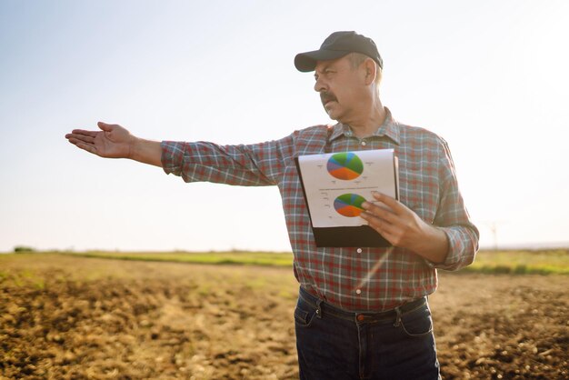 Farmer is checking soil quality before sowing Agriculture gardening or ecology concept