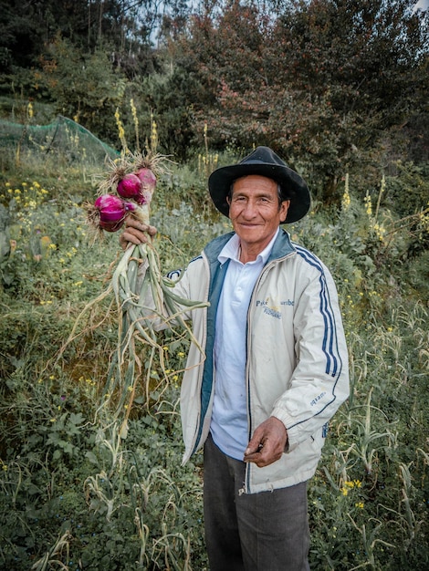 Farmer in organic farm in the mountains of Peru