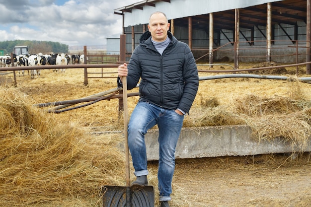 Farmer portrait  of farm cows