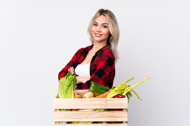 Farmer woman over isolated wall