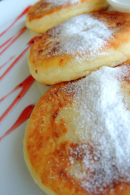 Farmers Cheese Pancakes On A Plate Closeup