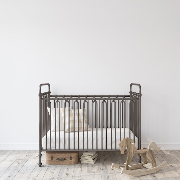 Farmhouse nursery. Black metal crib near empty white wall. Interior mock-up. 3d rendering.