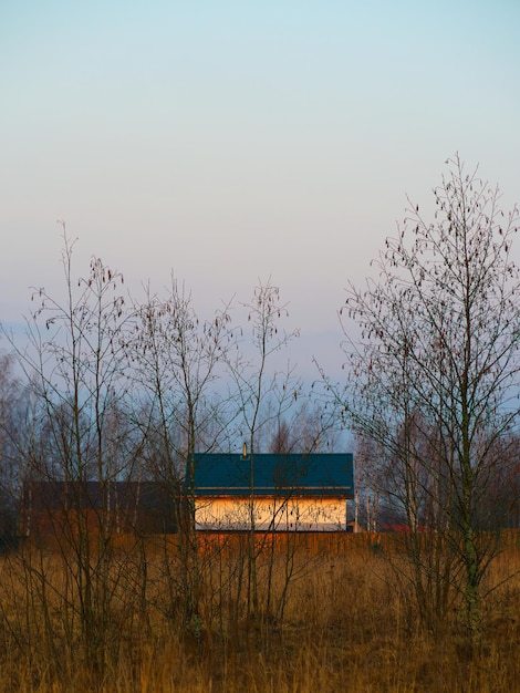 Farming house during dramatic sunset