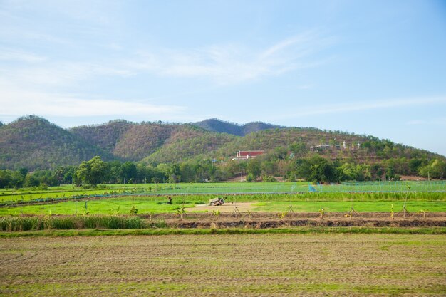 Farmland and mountains.