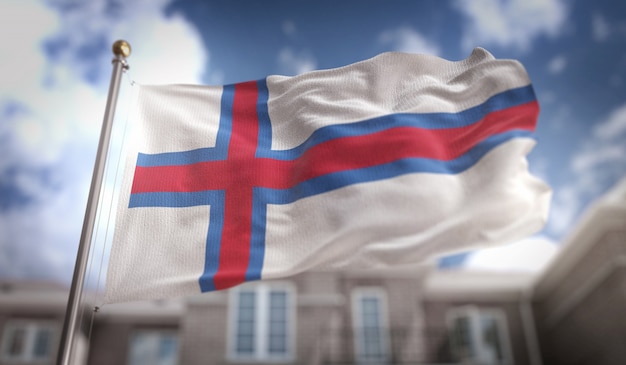 Faroe Islands Flag 3D Rendering on Blue Sky Building Background 