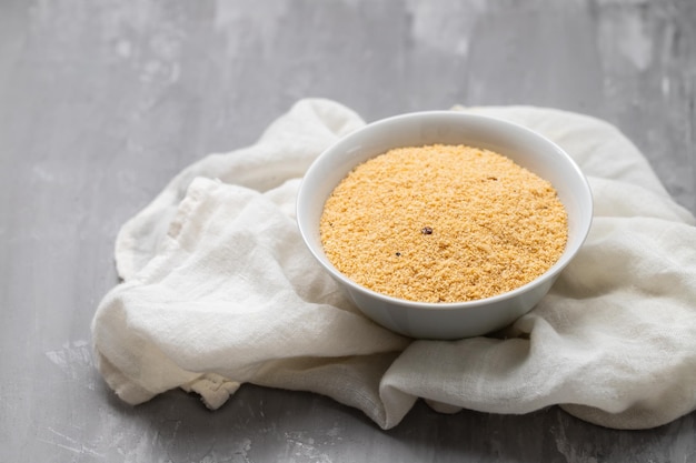 Farofa typical brazilian manioc flour side dish on ceramic