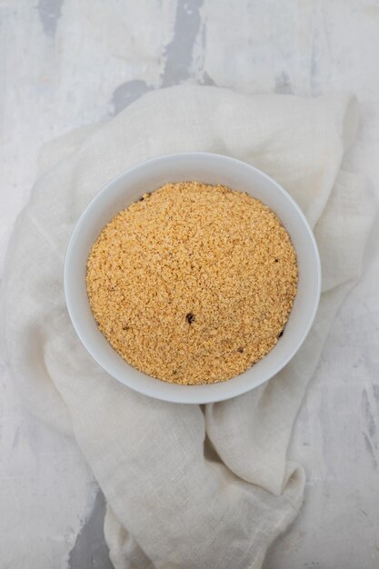 Farofa typical brazilian manioc flour side dish on ceramic