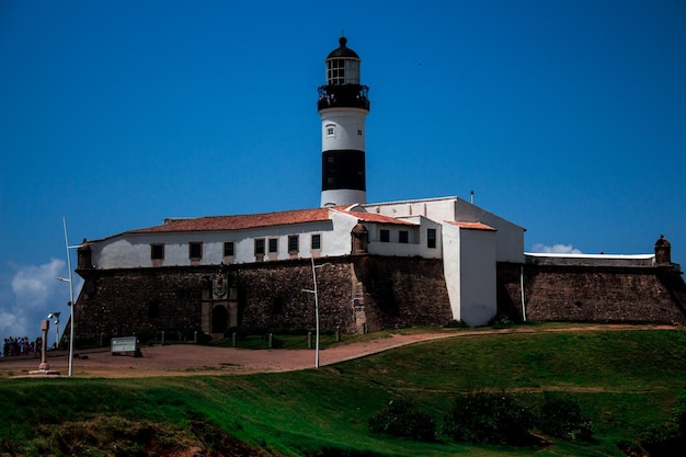 Farol da barra against blue sky