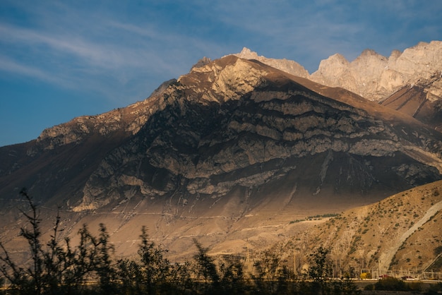 Fascinating nature, high majestic mountains under the blue sky