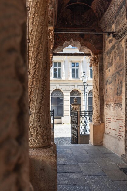 Fascinating wooden arched entrance in Stavropoleos Monastery in Brancovenesc Style Bucharest Romania