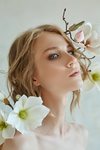 fashion beautiful woman portrait in flowers 