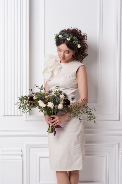 Fashion Beauty Model Girl with Flowers Hair.