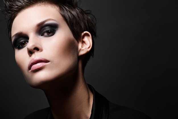 Fashion brunette woman with short hair cut