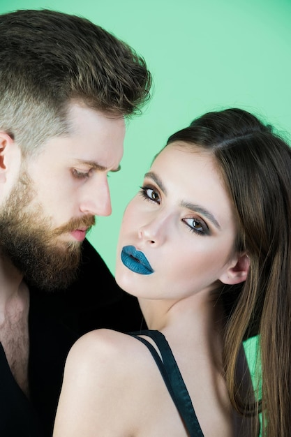 Fashion couple in black, woman and man