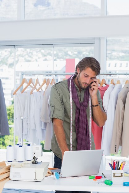 Fashion designer on the phone