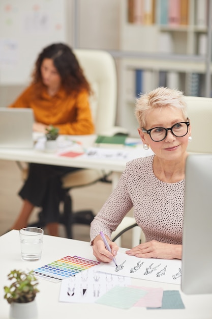 Fashion Designers Working In Office