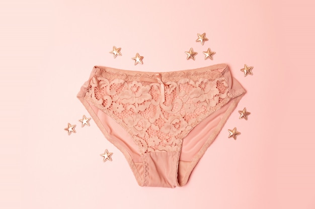 Fashion fashionable underwear. Lace white panties flat lay. 