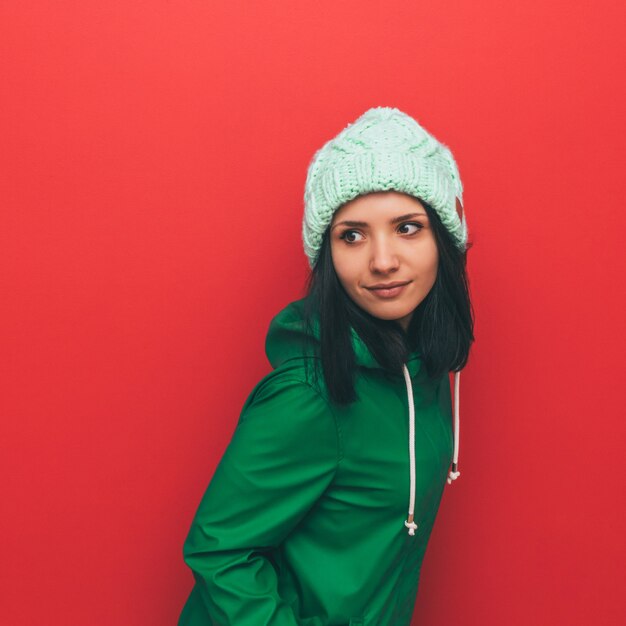 Fashion girl in green raincoat