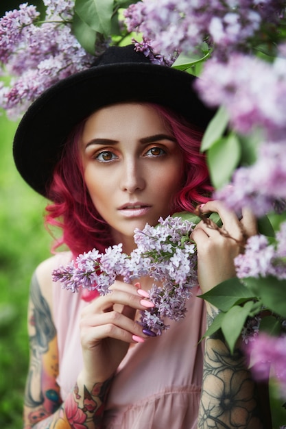 Fashion girl red hair and big hat vocation, spring