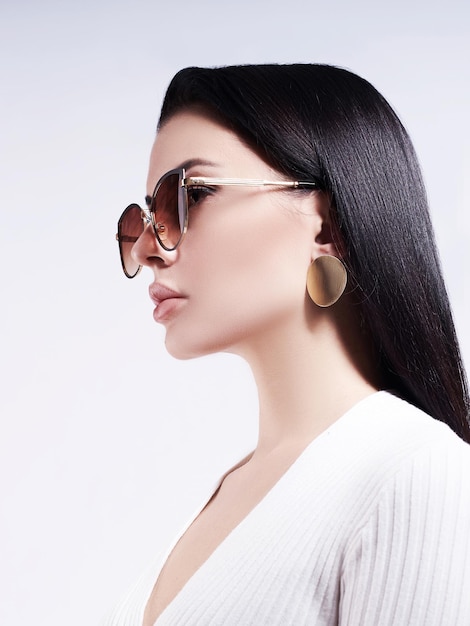 Fashion model in dark sunglasses