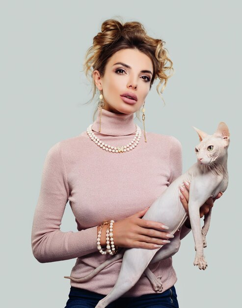 Fashion Model Womanl with Hairless Cat