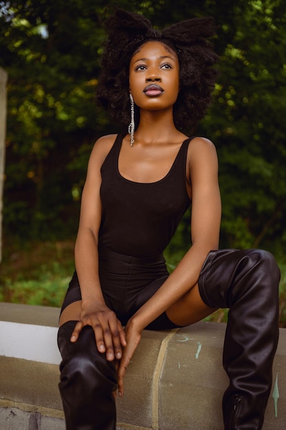fashion outdoor street style portrait beautiful young african american woman posing outside