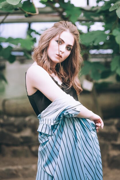 Fashion portrait in botanic garden