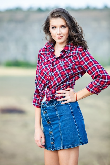 Fashion Portrait of Stylish Pretty Brunette Young Woman Outdoor