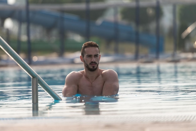 Fashion Portrait Of A Very Muscular Sexy Man In Underwear At Swimming Pool